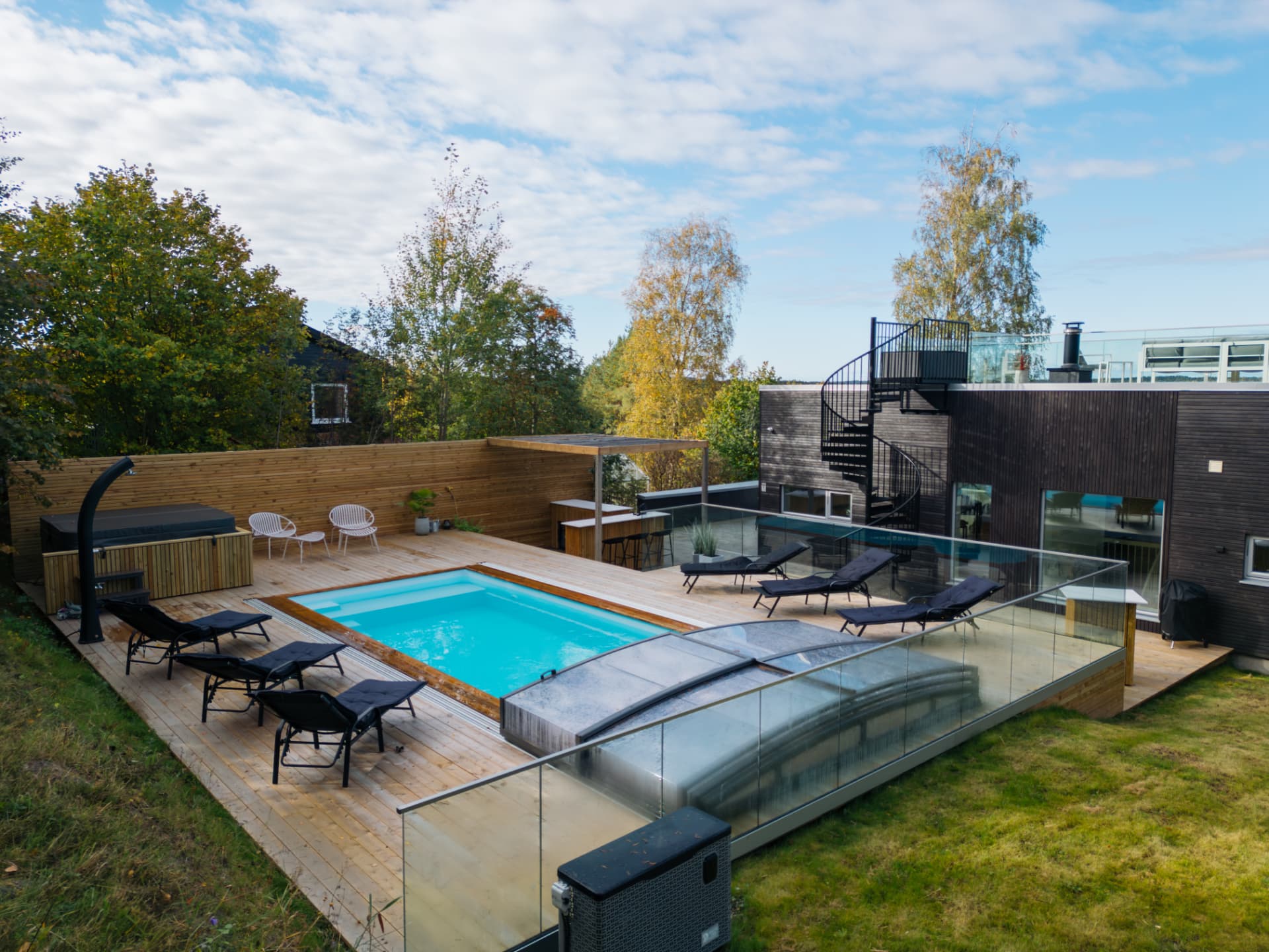 Aerial view of Villa Funkisdrøm with pool, terrace and rooftop